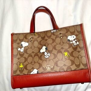 COACH x Peanuts Dempsey Carryall Signature Canvas, Leather Trim and Bottom